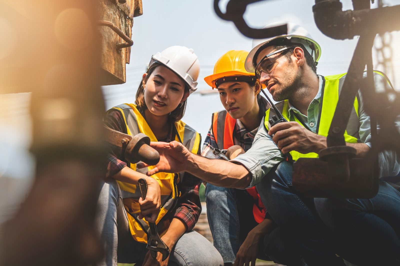 A Group Of Workers Working On Construction Site Aspect Ratio 1200 800