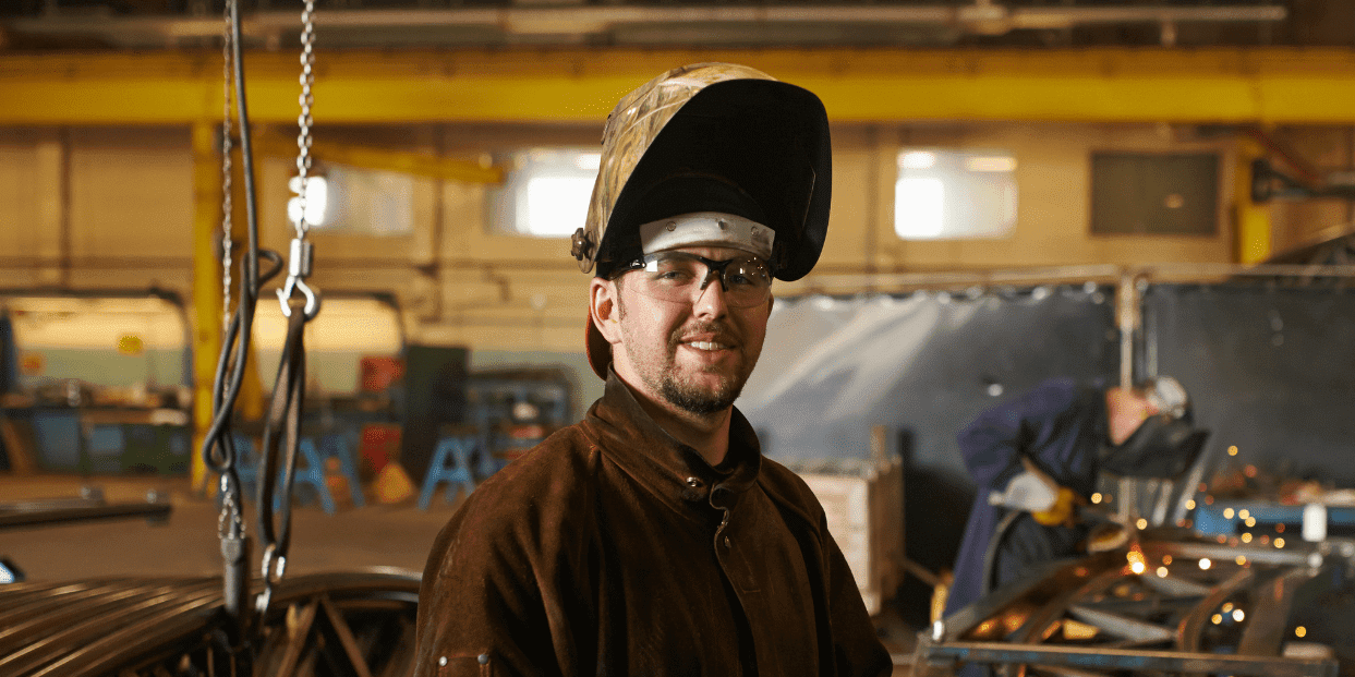 Apprentice Wearing PPE Working On Metal Welding Aspect Ratio 1160 580