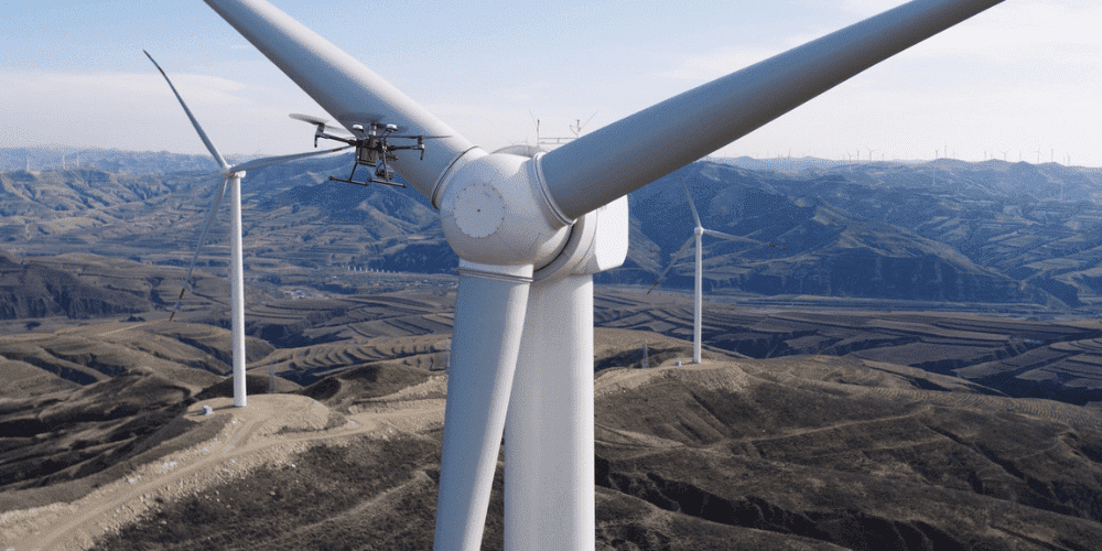 Drone Flying Close To A Wind Turbine Aspect Ratio 1160 580