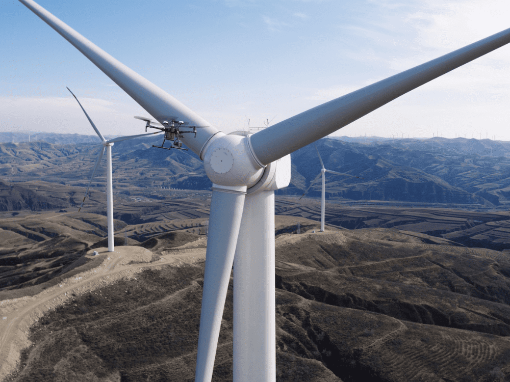 Drone Flying Close To A Wind Turbine