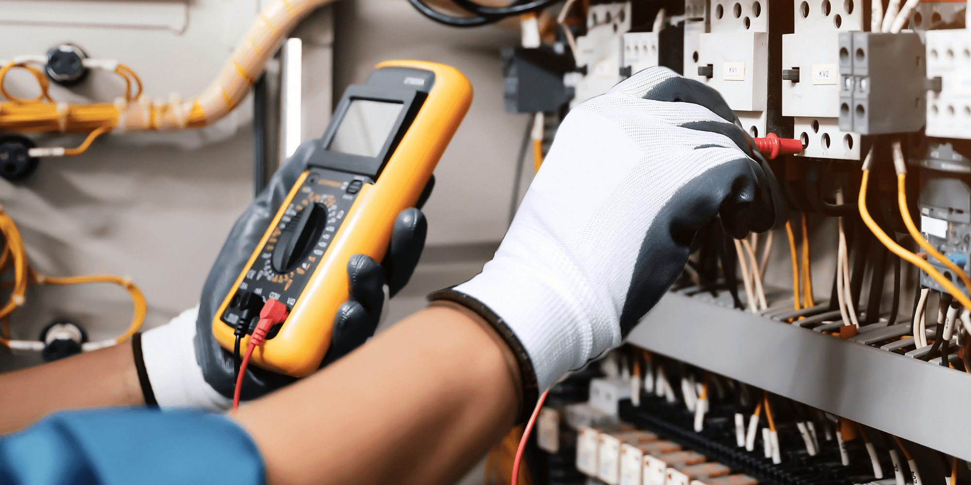 Electrical Person Wearing Safety Gloves Testing Wires 1 Aspect Ratio 1160 580
