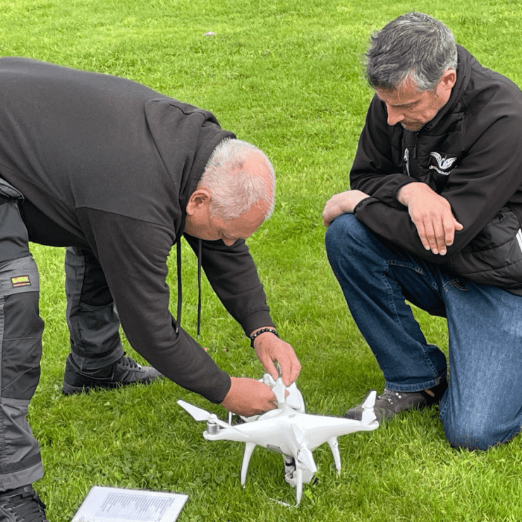 Julian Hoile With Global Drone Training Director Jonathan Carter Inspecting A Drone Aspect Ratio 740 740