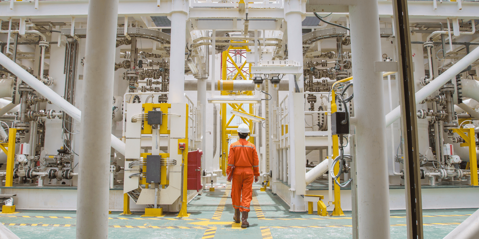 Site Operations Man Dressed In Orange Standing On Oil Rig Aspect Ratio 1160 580