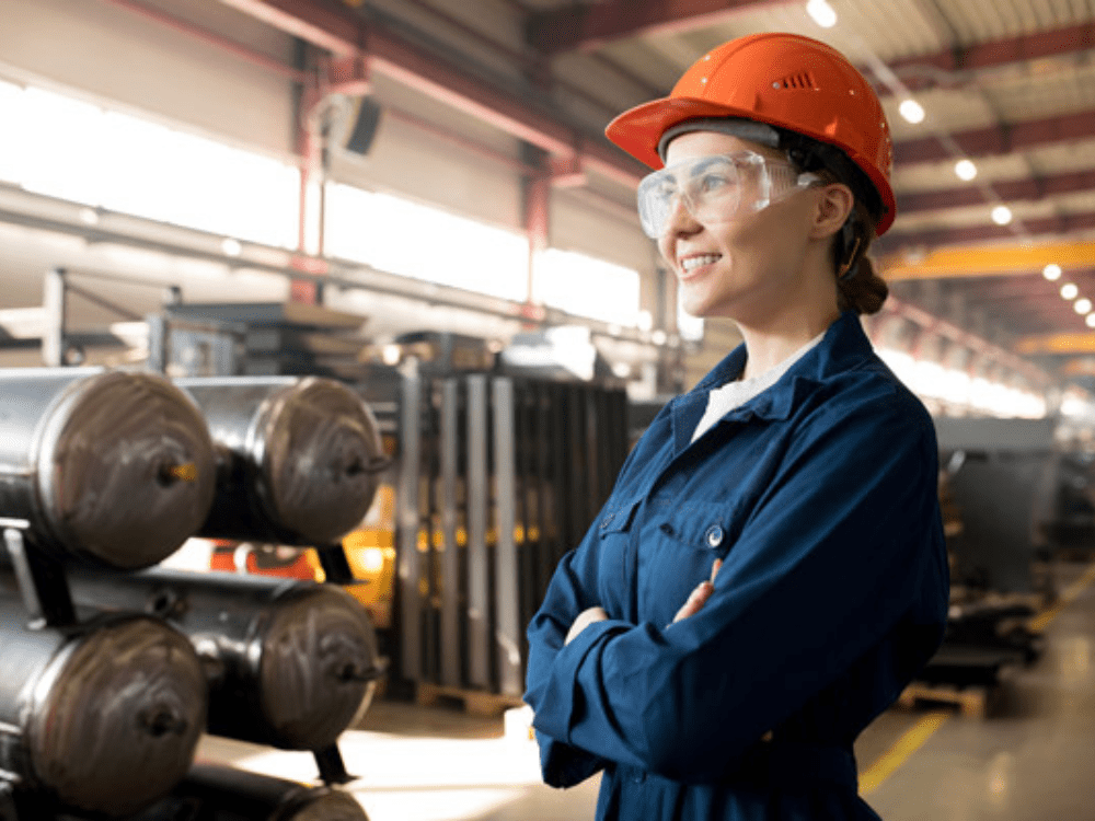 Smiling Woman In Red Hat And Blue Overalls