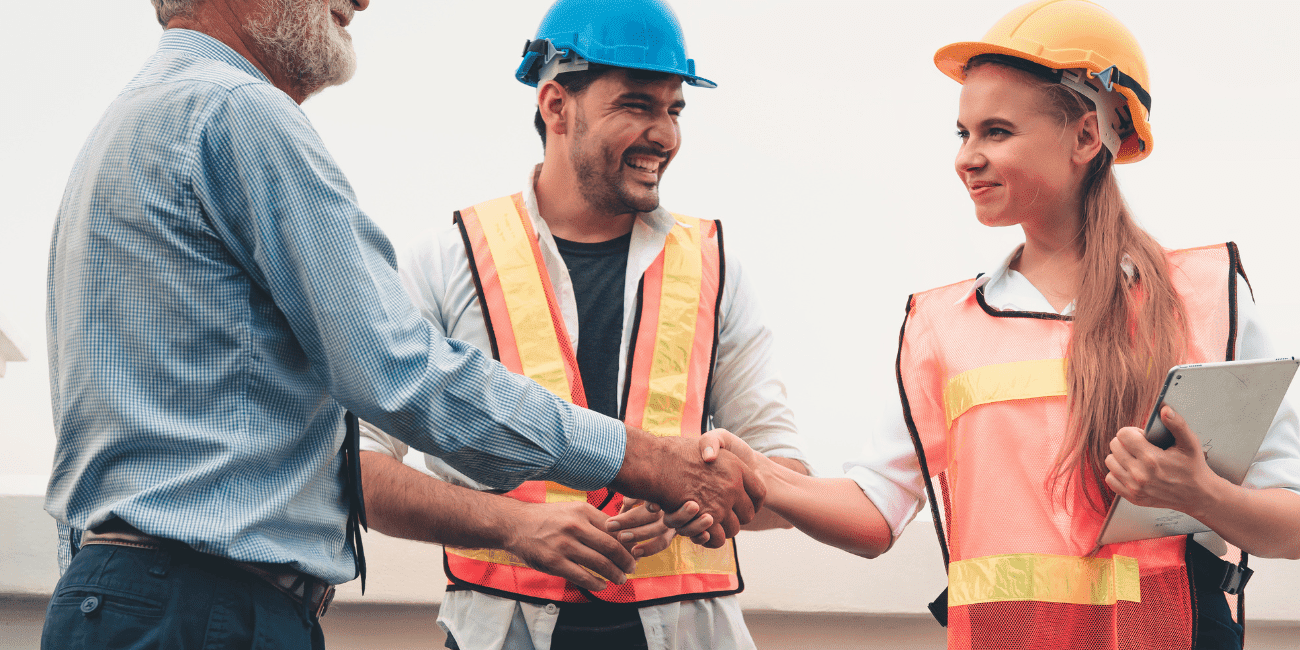 Woman With Tablet Shaking Hands With Man In Hard Hat 2 Aspect Ratio 1160 580